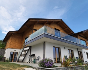 Décapage par aérogommage (sablage) d’une villa en bois à Arzier